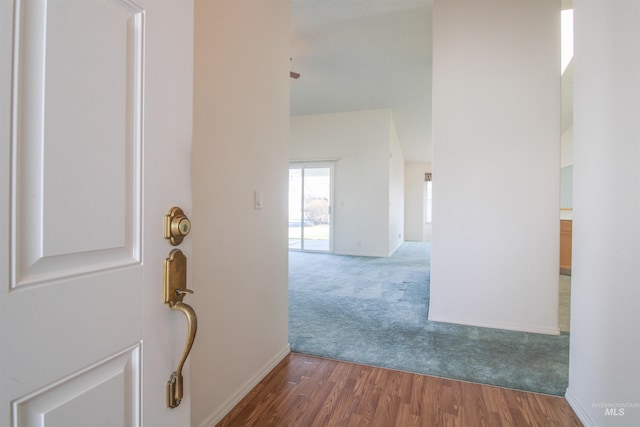 636 N Sterling St, Nampa, ID 83651 - hallway with carpet, baseboards, and wood finished floors