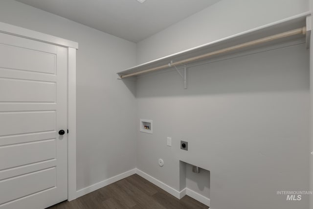 laundry area featuring laundry area, dark wood-type flooring, washer hookup, baseboards, and electric dryer hookup