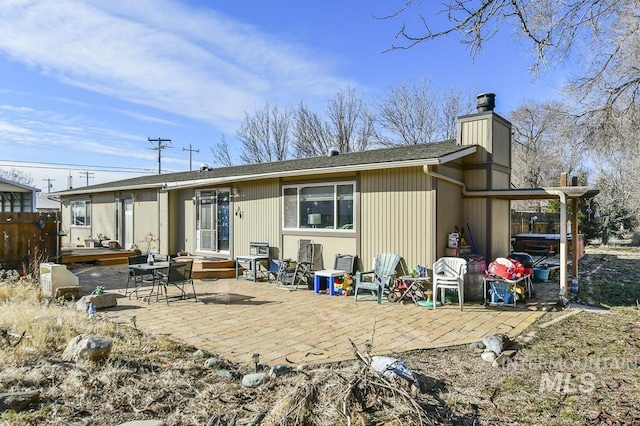 back of house featuring a patio area