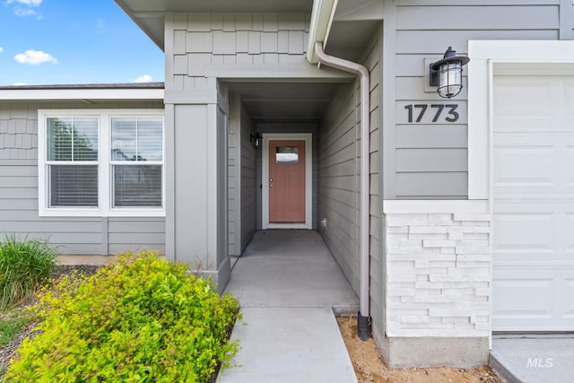 1773 E E Celbridge St, Nampa, ID 83686 - property entrance featuring a garage