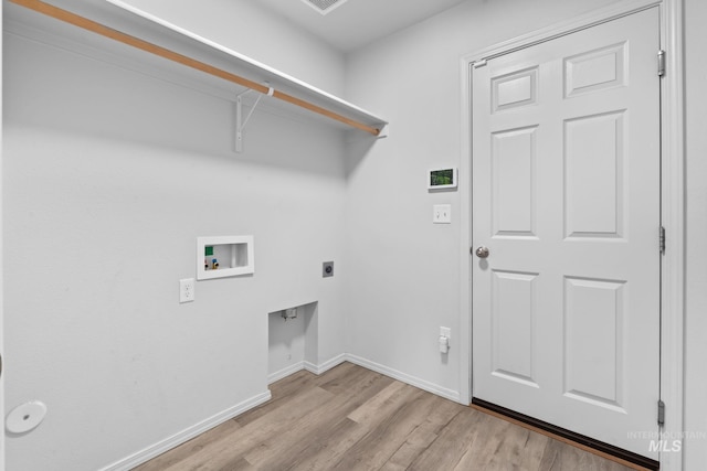 1773 E E Celbridge St, Nampa, ID 83686 - laundry area with hookup for a washing machine, light wood-type flooring, and electric dryer hookup