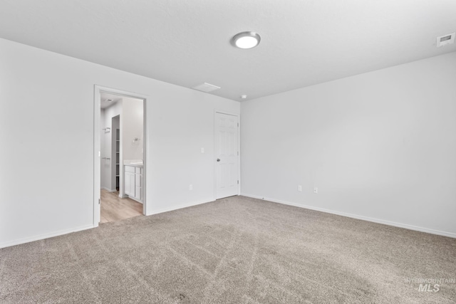 1773 E E Celbridge St, Nampa, ID 83686 - empty room with light colored carpet and baseboards