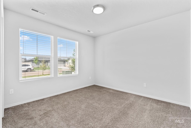 1773 E E Celbridge St, Nampa, ID 83686 - empty room featuring carpet floors and baseboards