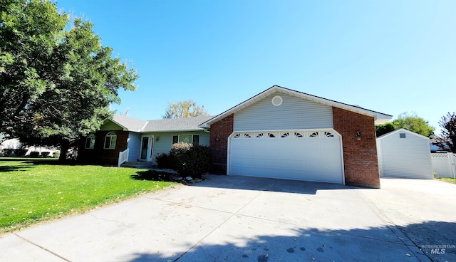 ranch-style house with a front yard and a garage