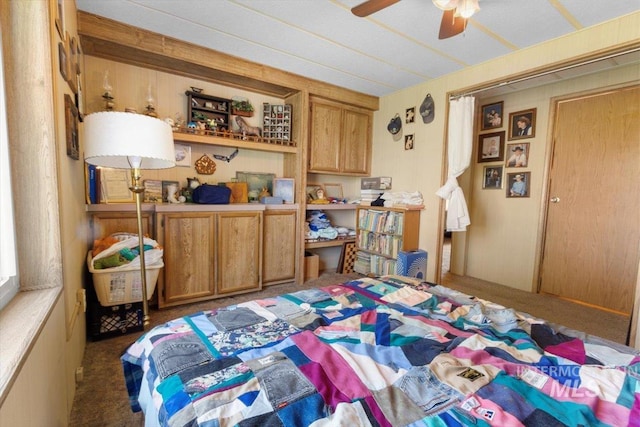 carpeted bedroom with a ceiling fan