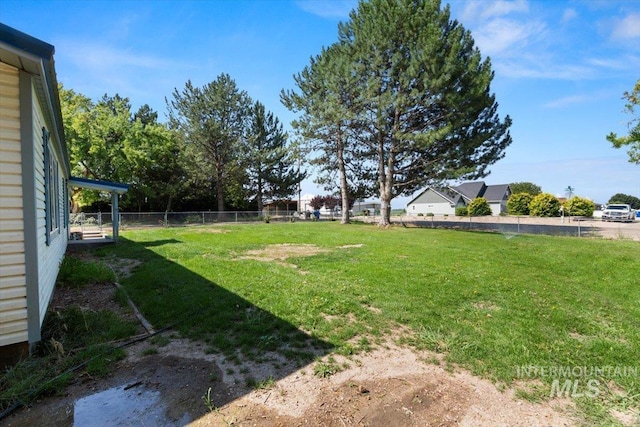 view of yard featuring fence