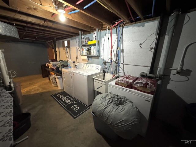 basement featuring washer and dryer