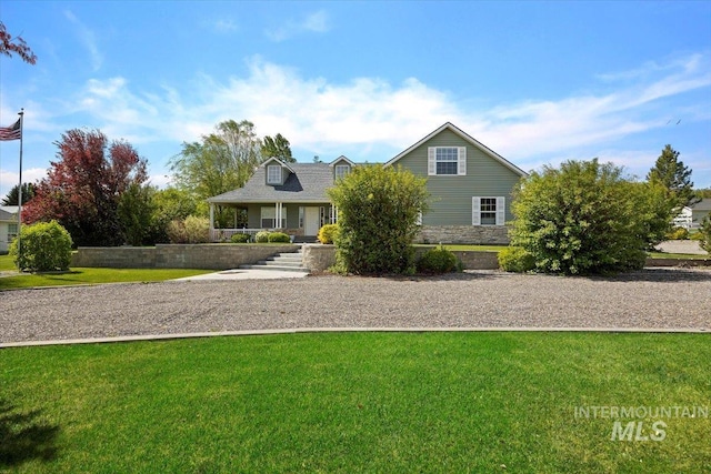 view of front of house featuring a porch and a front lawn