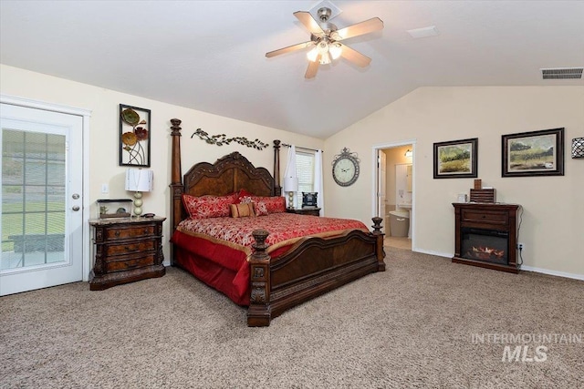 bedroom with ceiling fan, vaulted ceiling, carpet flooring, access to outside, and connected bathroom