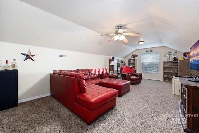 living room featuring carpet flooring, ceiling fan, and vaulted ceiling