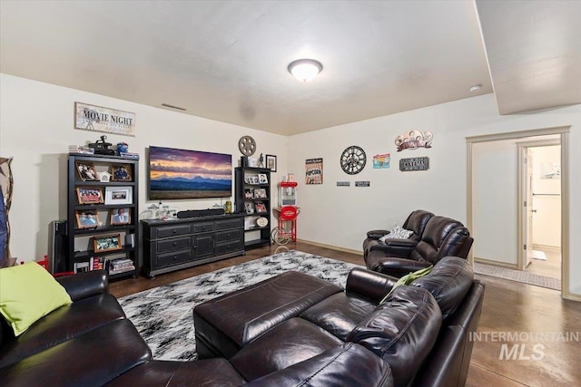 living room featuring concrete floors