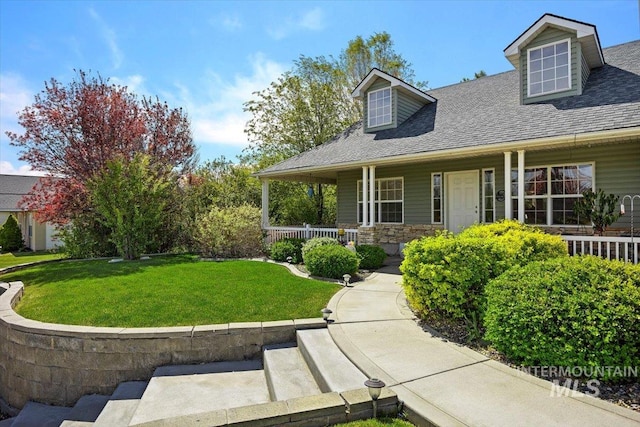 view of front of home with a front lawn and a porch