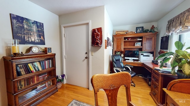 office with light wood-style floors