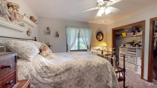 bedroom with carpet, a ceiling fan, and a closet