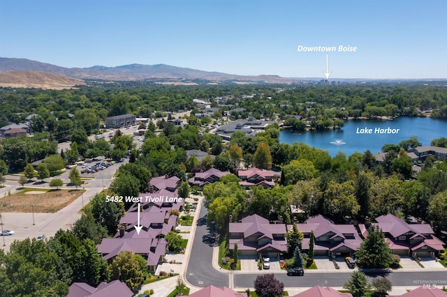 bird's eye view featuring a water and mountain view