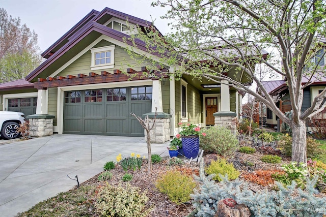 craftsman inspired home with a garage