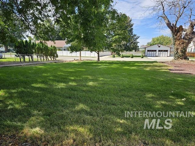 view of yard featuring a garage