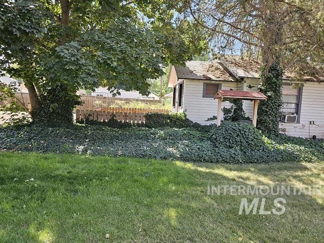 exterior space with a front yard