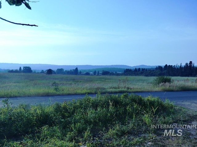 property view of water with a rural view