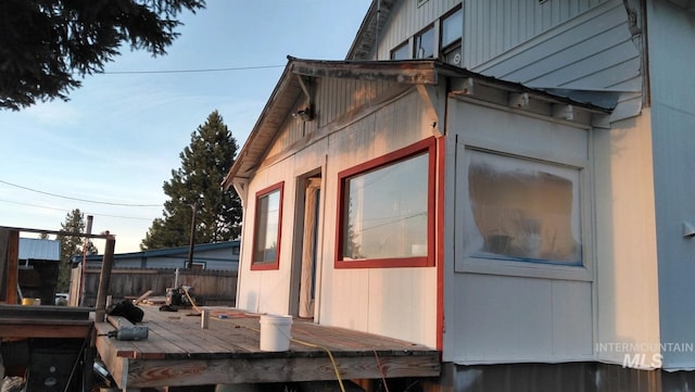 view of home's exterior with a deck