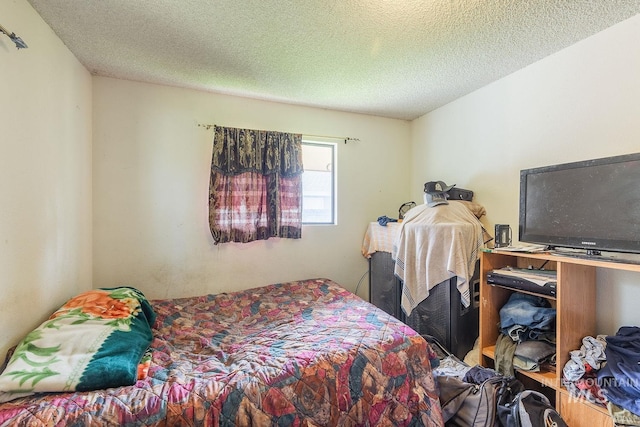 bedroom with a textured ceiling