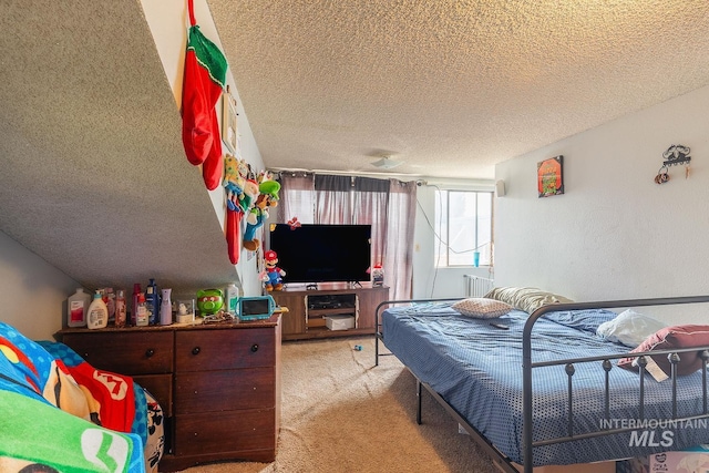 carpeted bedroom featuring a textured ceiling