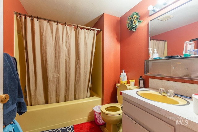 bathroom with visible vents, shower / tub combo with curtain, toilet, and vanity