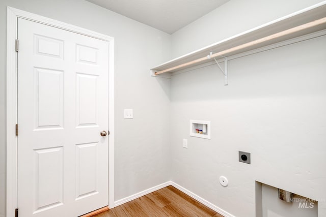 laundry room with washer hookup, hardwood / wood-style floors, and hookup for an electric dryer