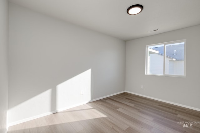 empty room featuring light hardwood / wood-style floors