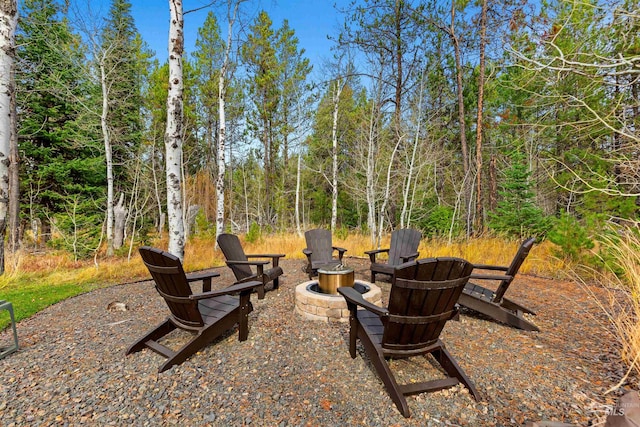 view of patio featuring an outdoor fire pit