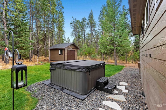 view of yard featuring a hot tub and a shed