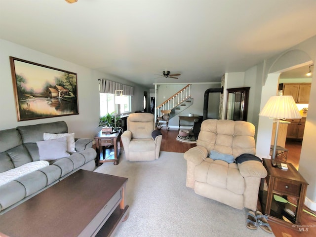 27406 Gem Ln, Juliaetta, ID 83535 - living room featuring ceiling fan, stairs, and arched walkways