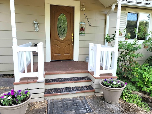 27406 Gem Ln, Juliaetta, ID 83535 - doorway to property featuring covered porch