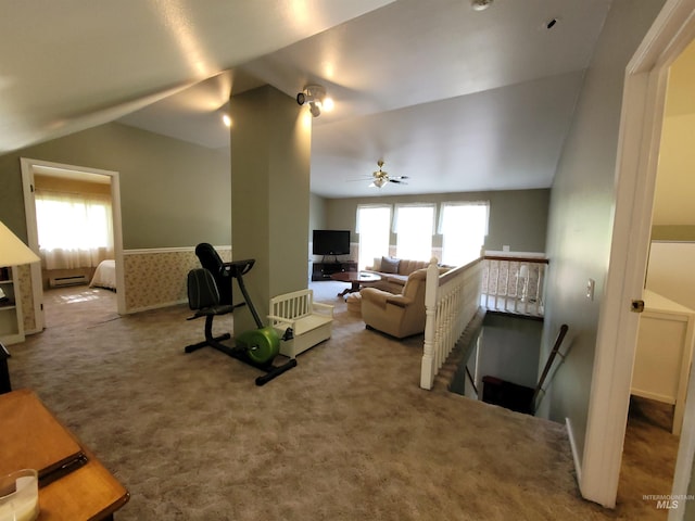 27406 Gem Ln, Juliaetta, ID 83535 - living room with vaulted ceiling, carpet floors, a ceiling fan, and baseboard heating