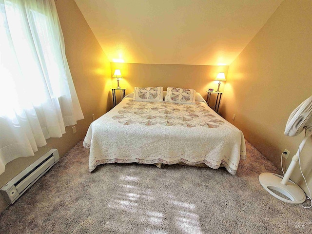 27406 Gem Ln, Juliaetta, ID 83535 - bedroom with baseboard heating, carpet flooring, and vaulted ceiling