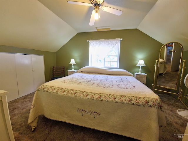 27406 Gem Ln, Juliaetta, ID 83535 - bedroom featuring dark colored carpet, vaulted ceiling, ceiling fan, and a closet