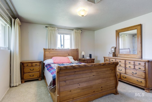 11360 W Lake Hazel Rd, Boise, ID 83709 - bedroom featuring light colored carpet