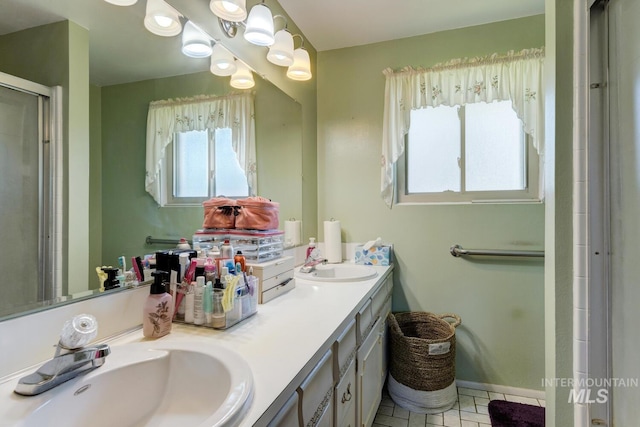 11360 W Lake Hazel Rd, Boise, ID 83709 - bathroom featuring double vanity, an enclosed shower, and tile patterned floors