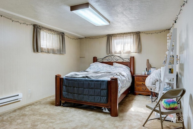 11360 W Lake Hazel Rd, Boise, ID 83709 - bedroom featuring a textured ceiling, carpet flooring, and baseboard heating