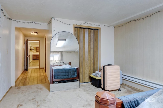 11360 W Lake Hazel Rd, Boise, ID 83709 - carpeted bedroom with a baseboard heating unit