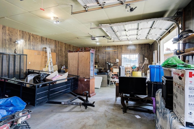 11360 W Lake Hazel Rd, Boise, ID 83709 - garage featuring wood walls and a garage door opener