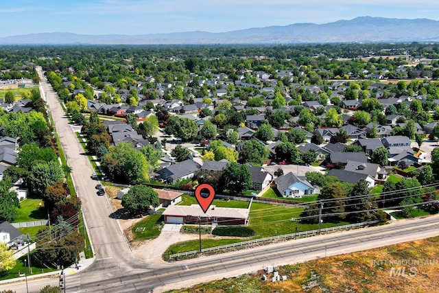 11360 W Lake Hazel Rd, Boise, ID 83709 - aerial view of residential area featuring a mountain backdrop