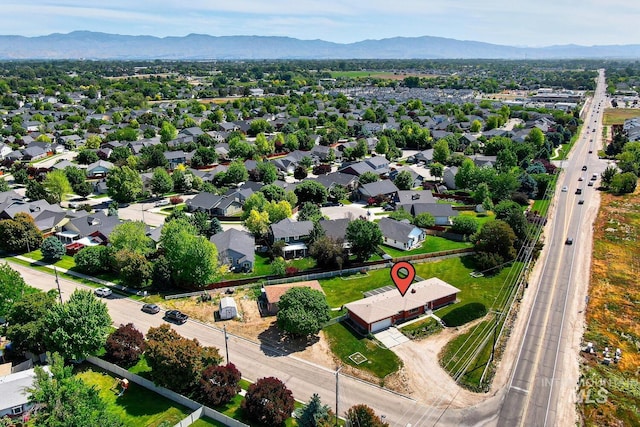 11360 W Lake Hazel Rd, Boise, ID 83709 - aerial perspective of suburban area featuring a mountain backdrop and a highway