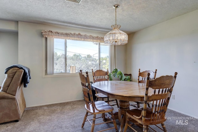 11360 W Lake Hazel Rd, Boise, ID 83709 - dining room featuring a chandelier, carpet, baseboards, and a textured ceiling