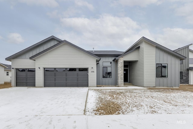 modern farmhouse featuring a garage