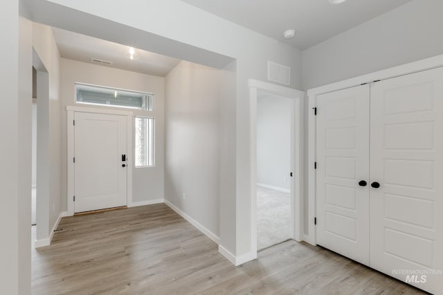 entrance foyer featuring light hardwood / wood-style flooring