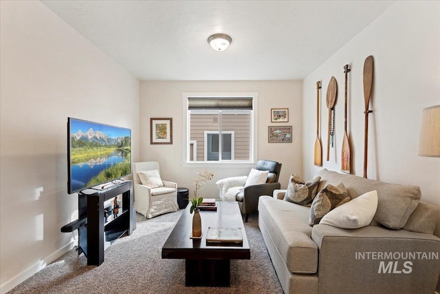 carpeted living room featuring baseboards