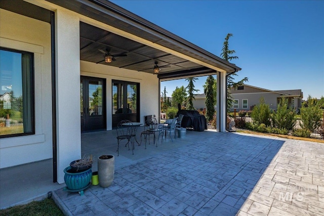 view of patio with ceiling fan