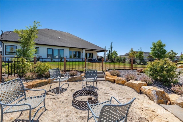 view of patio / terrace with a fire pit