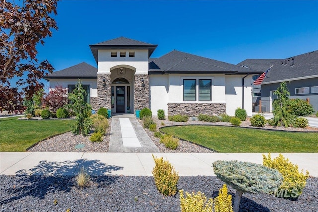 view of front of property with a front lawn